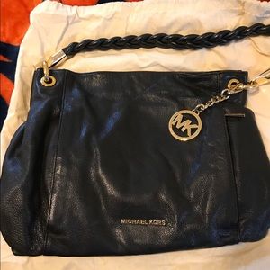 Michael Kors shoulder handbag.